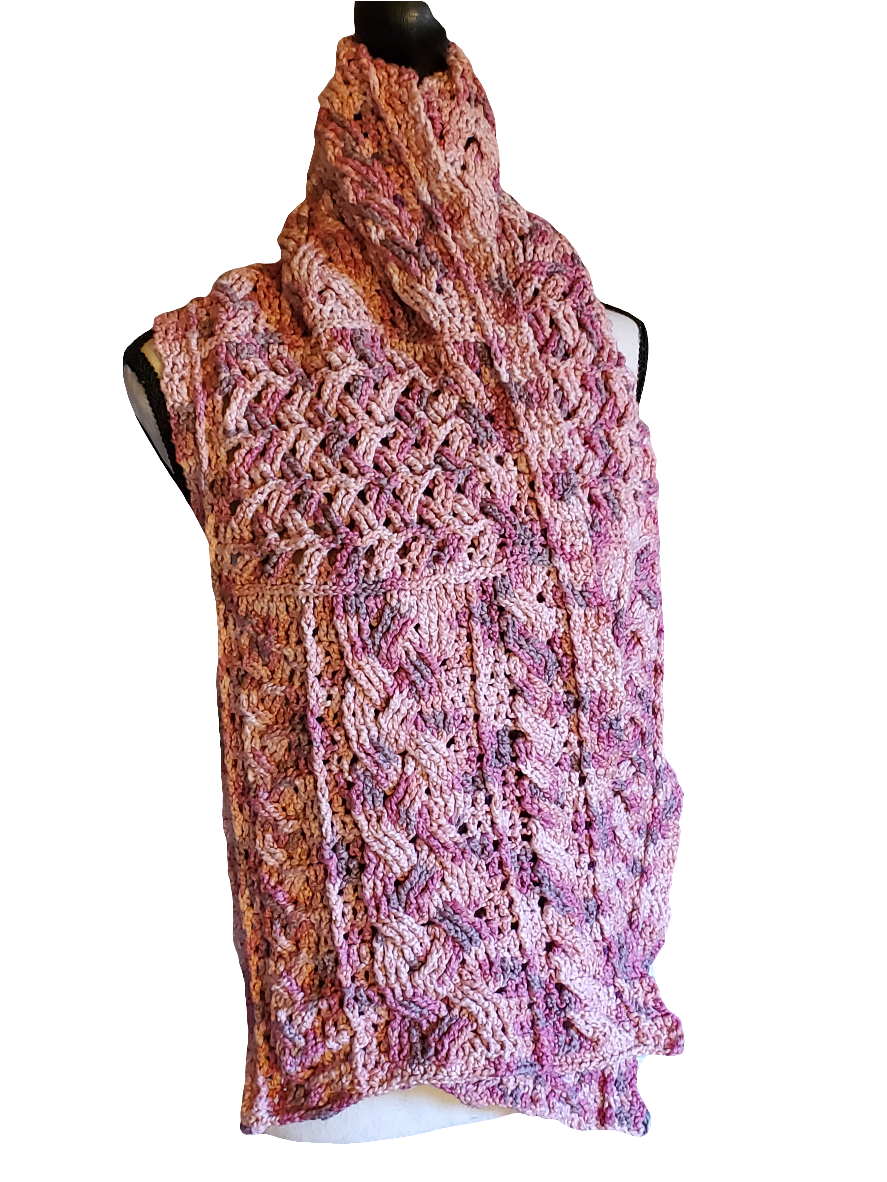 Handmade cotton blend cable scarf in various pinks with intricate design.