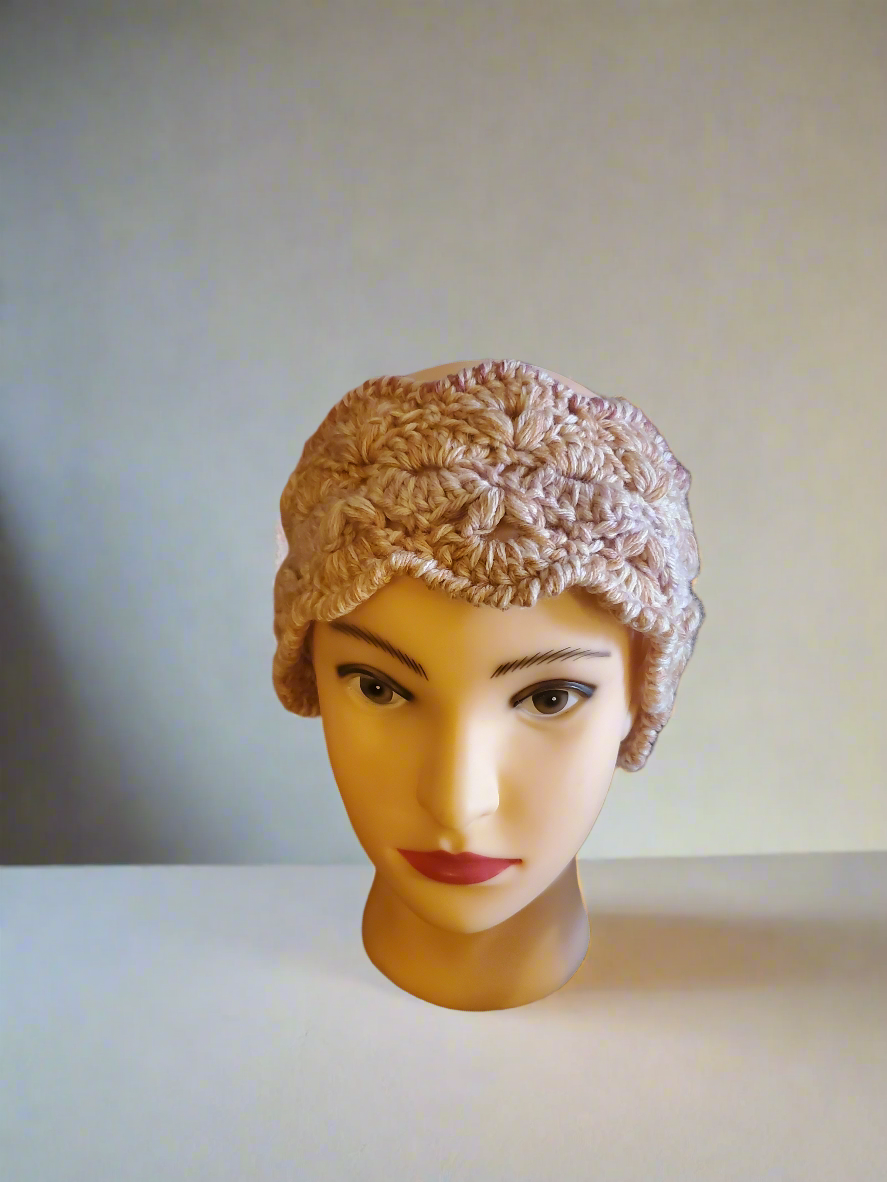 Pink crocheted earwarmer for women and teens, warm winter accessory.