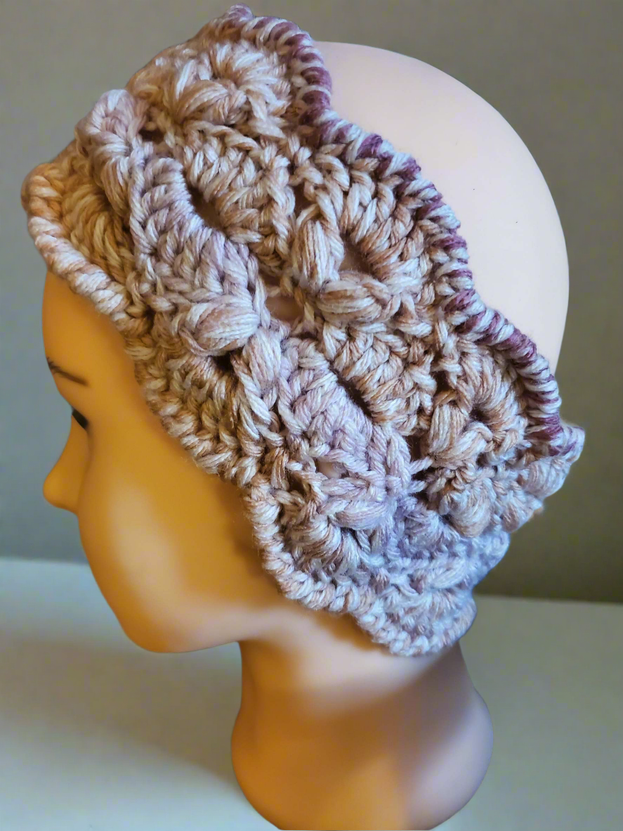 Peach and pink crocheted earwarmer for women and teens, warm winter accessory.