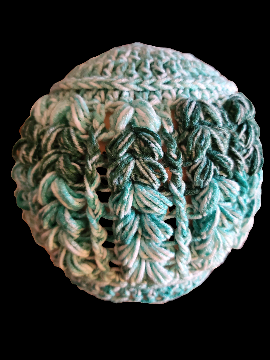 Crocheted green ombre beanie hat, elegant soft fashion accessory for any occasion.