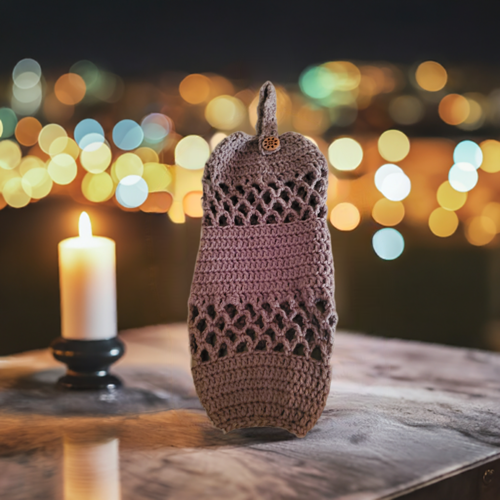 Handmade crocheted acrylic plastic bag holder, elegant design for organizing bags.