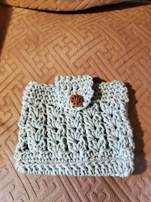 Super cute aqua handmade crocheted purse with 3mm cotton cord and golden pearl strap.