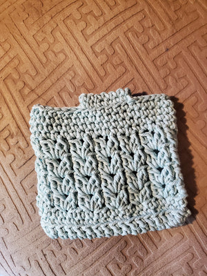 Super cute aqua handmade crocheted purse with cotton cord and golden pearl strap.