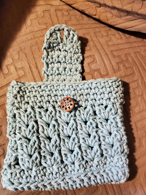 Aqua handmade crocheted purse with 3mm cotton cord and golden pearl strap.