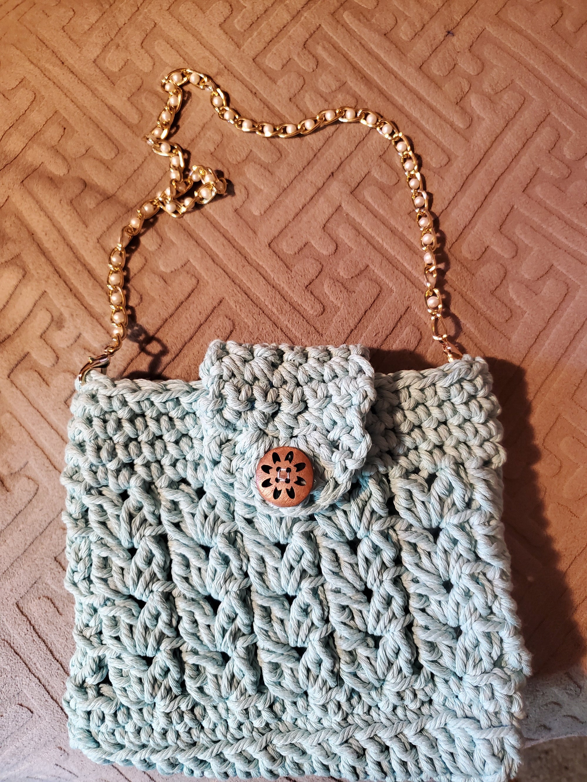 Super cute aqua handmade crocheted purse with golden pearl strap and 3mm cotton cord.