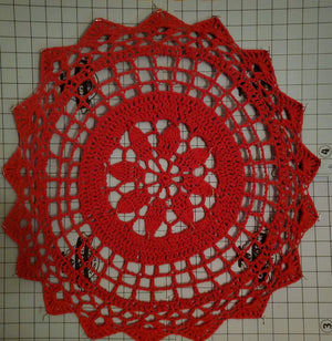 Red Christmas placemat doily, 20-inch festive home decor.