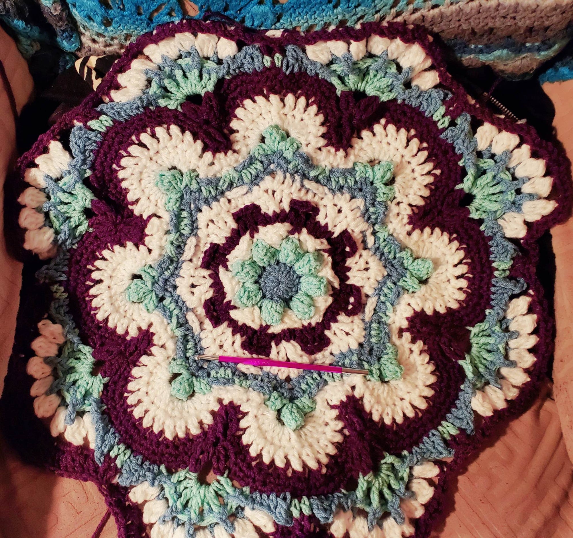 Crocheted Heritage Mandala Baby Girl Blanket with intricate design, 35 inches square, soft and cozy.