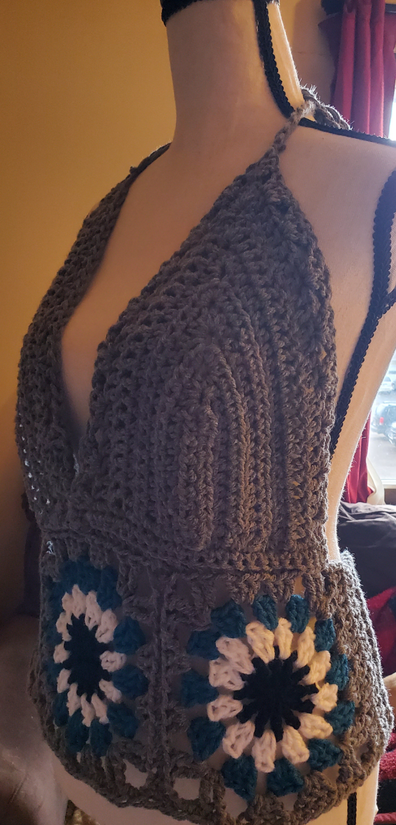 Handmade crocheted granny square tank top in white, teal, black, and gray with vintage halter design.