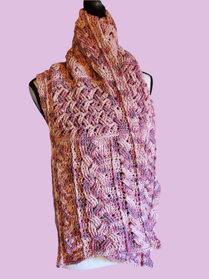 Handmade cotton blend cable scarf in various pinks with intricate crocheted design.