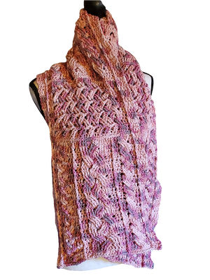 Handmade cotton blend cable scarf in various pinks with intricate design.