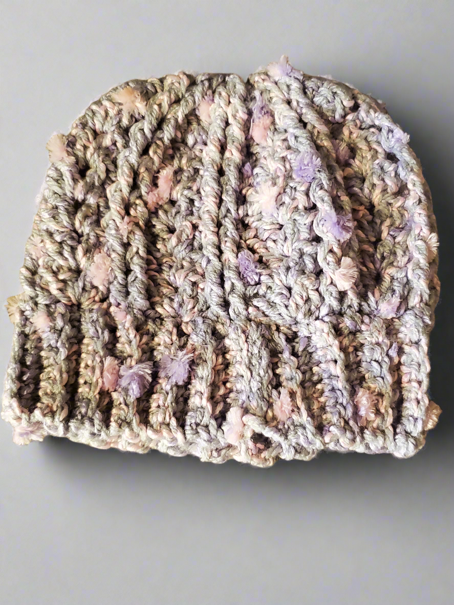 Gorgeous soft crocheted baby hat in gray with multicolor speckles.