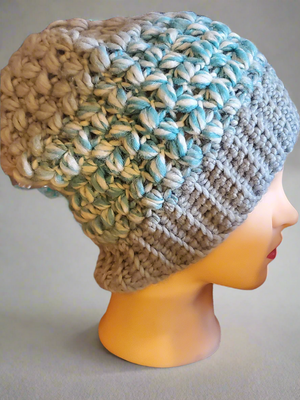 Soft chunky warm crocheted light blue slouch hat for men or women.