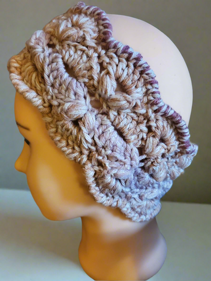 Peach and pink crocheted earwarmer for women and teens, warm winter accessory.