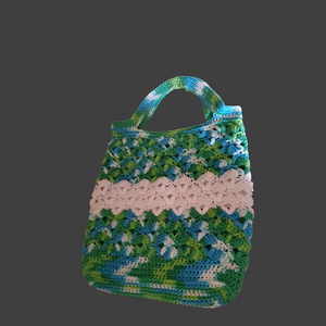 Handmade cotton variegated green, blue, and white crocheted market bag.