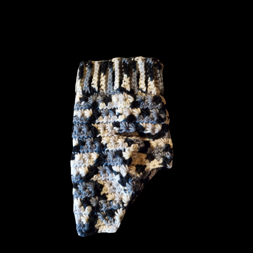 Adorable black, gray, and white camouflage XS dog sweater for small breeds.