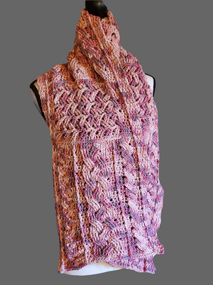 Handmade cotton blend cable scarf in various pinks with intricate crocheted design.