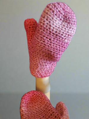 Beautifully crocheted soft pink hat and mittens set for women and teens.